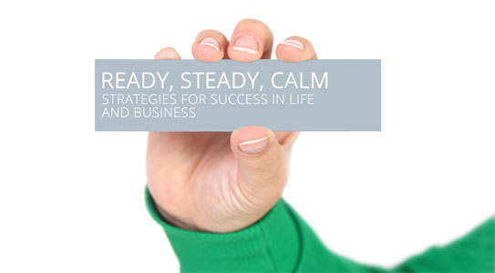 Hand holding a card with the words "Ready, Steady, Calm" written on it